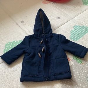 Navy Blue Pea Coat with Brown Toggles.